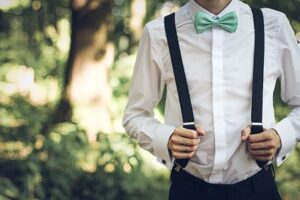 groom on suspenders